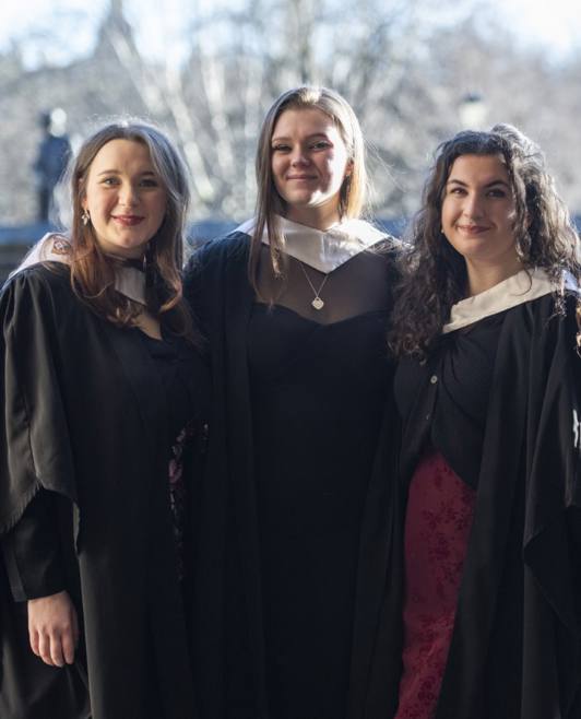 3 female graduates in the garden 3 female graduates in the garden